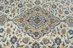 Central medallion detail of 2000s Kashan rug from Iran / Persia
