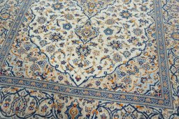 Close-up detail of 2000s Kashan rug from Iran / Persia showing Wool weave