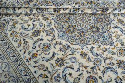 Close-up detail of 2000s Kashan rug from Iran / Persia showing Wool weave