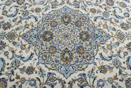 Central medallion detail of 2000s Kashan rug from Iran / Persia