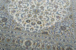 Close-up detail of 2000s Kashan rug from Iran / Persia showing Wool weave