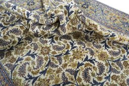 Surface texture of 1970s Kashan rug with natural Wool and intricate pattern