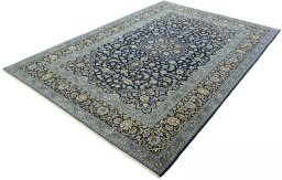 Corner detail of 2000s Kashan rug showing border pattern and Wool pile