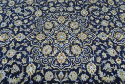 Central medallion detail of 2000s Kashan rug from Iran / Persia