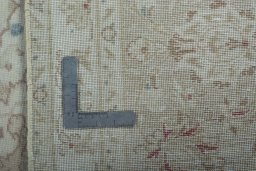 Backside of handmade 1970s Kashan rug showing knot structure and weave density