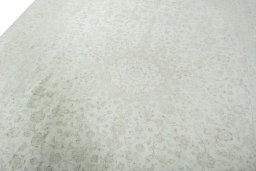 Backside of handmade 1970s Kashan rug showing knot structure and weave density