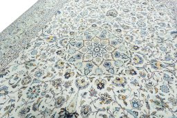 Backside of handmade 2000s Kashan rug showing knot structure and weave density