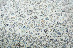 Close-up detail of 2000s Kashan rug from Iran / Persia showing Wool weave