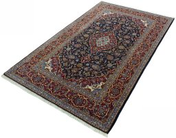 Corner detail of New Kashan rug showing border pattern and Cork pile