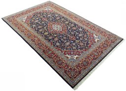 Close-up detail of New Kashan rug from Iran / Persia showing Cork weave