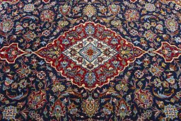 Central medallion detail of New Kashan rug from Iran / Persia