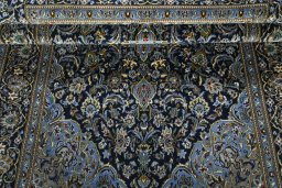 Close-up detail of New Kashan rug from Iran / Persia showing Cork weave