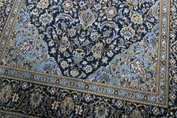 Close-up detail of New Kashan rug from Iran / Persia showing Cork weave