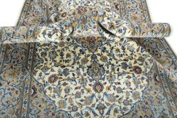 Backside of handmade New Kashan rug showing knot structure and weave density