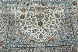 Surface texture of New Kashan rug with natural Cork and intricate pattern