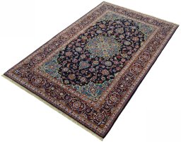 Corner detail of New Kashan rug showing border pattern and Cork pile