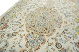 Backside of handmade 1970s Kashan rug showing knot structure and weave density