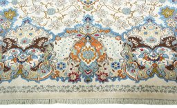 Corner detail of 1970s Kashan rug showing border pattern and Wool pile