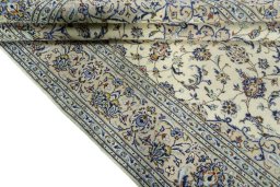 Close-up detail of 2000s Kashan rug from Iran / Persia showing Wool weave