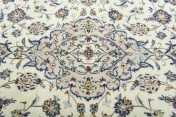 Central medallion detail of 2000s Kashan rug from Iran / Persia