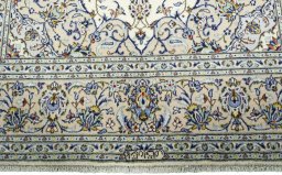Full view of 2000s Kashan rug from Iran / Persia, 311 × 193 cm in Beige tones