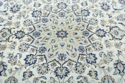 Central medallion detail of 2000s Kashan rug from Iran / Persia