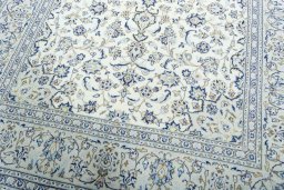 Close-up detail of 2000s Kashan rug from Iran / Persia showing Wool weave