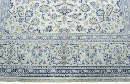 Full view of 2000s Kashan rug from Iran / Persia, 305 × 197 cm in Beige tones