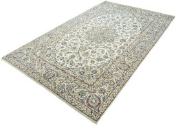 Corner detail of New Kashan rug showing border pattern and Wool pile