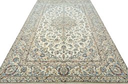 Surface texture of New Kashan rug with natural Wool and intricate pattern