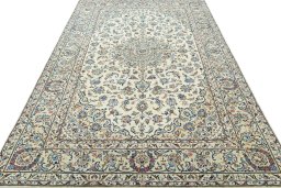 Surface texture of New Kashan rug with natural Wool and intricate pattern