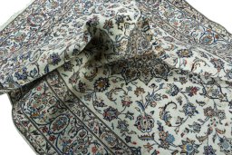 Surface texture of 2000s Kashan rug with natural Wool and intricate pattern