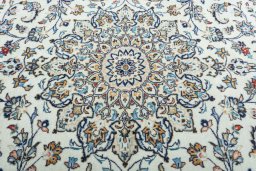 Central medallion detail of 2000s Kashan rug from Iran / Persia