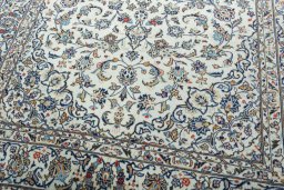 Close-up detail of 2000s Kashan rug from Iran / Persia showing Wool weave