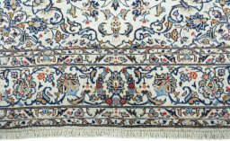 Full view of 2000s Kashan rug from Iran / Persia, 298 × 195 cm in Beige tones