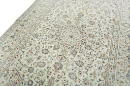 Backside of handmade 2000s Kashan rug showing knot structure and weave density