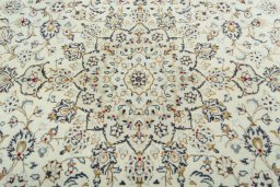Central medallion detail of 2000s Kashan rug from Iran / Persia