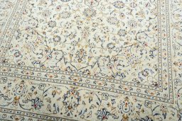 Close-up detail of 2000s Kashan rug from Iran / Persia showing Wool weave
