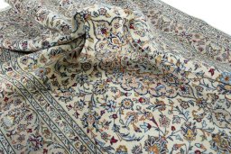 Surface texture of New Kashan rug with natural Wool and intricate pattern