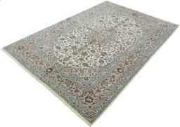Corner detail of New Kashan rug showing border pattern and Wool pile