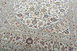 Close-up detail of New Kashan rug from Iran / Persia showing Wool weave