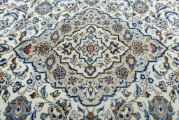 Central medallion detail of 2000s Kashan rug from Iran / Persia