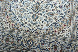 Close-up detail of 2000s Kashan rug from Iran / Persia showing Wool weave