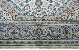 Full view of 2000s Kashan rug from Iran / Persia, 295 × 198 cm in Beige tones