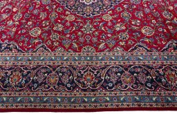 Corner detail of Unknown Kashan rug showing border pattern and Wool pile