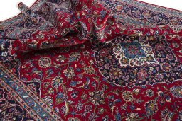 Surface texture of Unknown Kashan rug with natural Wool and intricate pattern