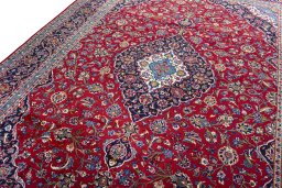 Backside of handmade Unknown Kashan rug showing knot structure and weave density