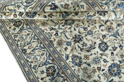 Close-up detail of New Kashan rug from Iran / Persia showing Wool weave