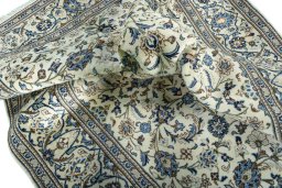 Surface texture of New Kashan rug with natural Wool and intricate pattern