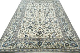 Surface texture of New Kashan rug with natural Wool and intricate pattern